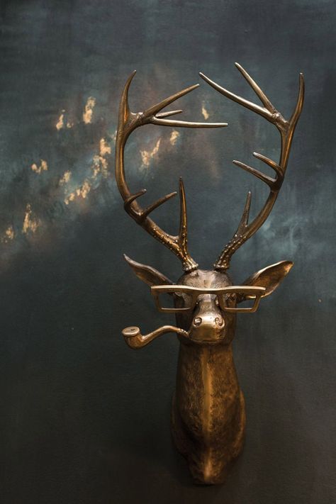 Unleash the whimsical and wild with this exclusive Frankie Stag Wall Mount from the beloved Eric and Eloise Collection. Artfully crafted from the finest materials, this handsome piece is sure to become a stunning centerpiece in any room. Charismatic and captivating, the stag 47" with an eye-catching pair of glasses perched upon his nose. Add a touch of subtle beauty to your home with this lovely wall mount. This item leaves our warehouse in 5-10 business days SPECIFICATIONS: 13.0 x 8.0 x 47.0Met Stag Animal, Animal Head Wall Decor, Deer Head Wall Decor, Animal Head Wall, Stag Head, Deer Wall, A Deer, Deer Head, Arbonne