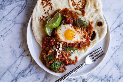 Indian Style Baked Eggs with Green Harissa + Naan | halfbakedharvest.com @hbharvest Break Fast Morning Breakfast Indian, Fast Morning Breakfast, Morning Breakfast Indian, Green Harissa, Curried Eggs, Breakfast Indian, Protein Vegetables, Homemade Naan, Baked Eggs Recipe