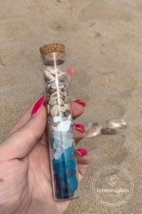 One of my favorites. Glass vial with natural Costa Blanca stones and blue sea glass Sea Glass In A Jar, Beach In A Jar, Beach Jar, Beach Christmas Decorations, Bead Bottle, Wind Chimes Craft, Memory Jar, Mini Glass Bottles, Jar Art