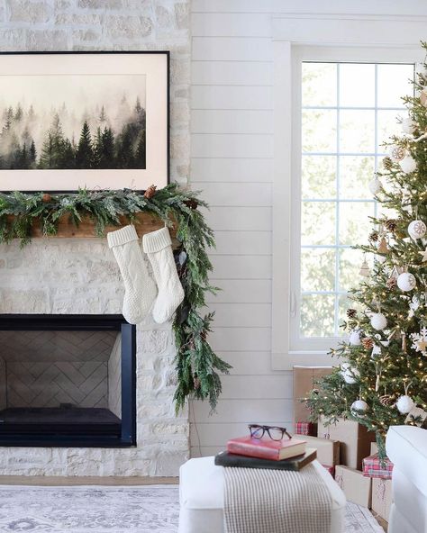 Morgan Alexandra on Instagram: “Happy Sunday! I’ve had a few people ask me about the art above the fire place… it’s not art, it’s a @samsungcanada frame TV. We absolutely…” Samta Picture Above Fireplace, Norfolk Pine Garland, Winter Frame Tv Art, Norfolk Pine, Pine Garland, Holiday Greenery, Christmas Mantle Decor, Holiday Flower, Greenery Garland