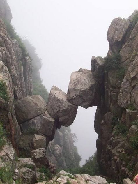 On the steep slopes of Mt Tai in China’s Shandong province, you’ll find the Immortal Bridge. Hopefully you won’t be forced to cross it on the way to complete your journey. Looking like a scene from an Indiana Jones flick, the Immortal Bridge is formed from massive stone blocks precariously balanced against one another. Avatar Kyoshi Aesthetic, Scary Mountain Aesthetic, Earth Kingdom Aesthetic, Tribe Aesthetic, Earth Bending, Earth Kingdom, Water Tribe, Fire Nation, Breath Of The Wild