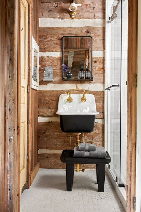 Tour a Transformed Log Cabin in Central Texas - D Magazine Cabin Remodel On A Budget, Cowboy Cabin Interior Design, Updated Cabin Interior, Cabin Powder Room, Mountain Cabin Bathroom, Remodeled Cabin, Tiny Cabin Bathroom, Modern Log Cabin Interior, Log Cabin Homes Interior