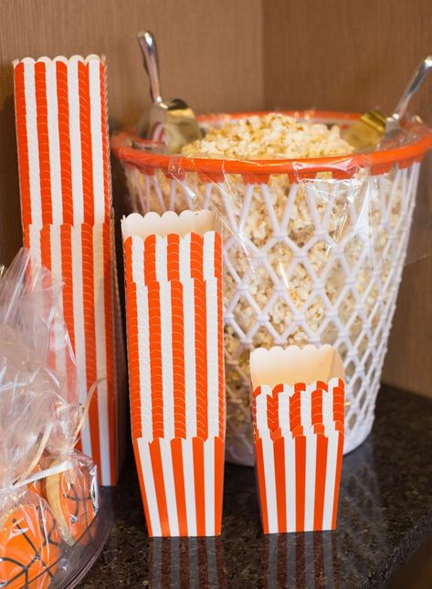 2016 Basketball Party | Create a fun snack bar complete with popcorn. We put ours in a basketball net bin and provided striped popcorn boxes for easy refills! Basketball Themed Birthday Party, Basketball Theme Birthday, Ball Birthday Party, Basketball Baby Shower, Bar Deco, Basketball Theme Party, Sweet 16 Themes, Basketball Birthday Parties, Basketball Baby