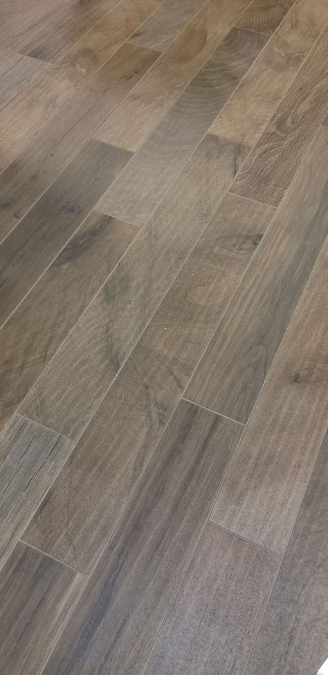 Straight from the showroom floor! One of our favorite wood-look tiles is Woodker Brown. It's the perfect mix of brown, taupe, and gray. . . . #unitedtileco #shoplocal #shreveportremodeling #bossierremodeling #edimax #woodker #brown #woodlooktile #tile #flooring #interior #woodlook #renovationproject #tiles #interiordesign #porcelaintile #design #woodtile #porcelain #ceramics #wood #tileinstallation #bathroomdesign #tilefloor  #grain #natureinspired Wood Tile Floor Whole House, Brownish Grey Flooring, Grey Brown Flooring Kitchen, Brown And Grey Flooring, Brown Floor Tiles Bathroom, Gray And Brown Flooring, Woodlook Floor Tiles, Brown Gray Flooring, Taupe Wood Floors