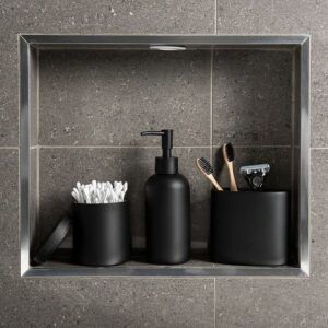 Trendy black washroom accessories redefine modern elegance, offering a sleek and sophisticated touch to bathroom aesthetics. Matte black faucets stand out as striking focal points, their minimalist design and luxurious finish transforming traditional functionality into a contemporary statement. Complementing these fixtures, black soap dispensers, toothbrush holders, and towel bars contribute to a cohesive and stylish look. Black-framed mirrors add depth and sophistication. Matte Black Accessories, Black Bathroom Sets, Men Bathroom, Black Bathroom Accessories Set, Matte Black Bathroom Accessories, Black Room Decor, Monochrome Bathroom, Mens Bathroom, Washroom Accessories