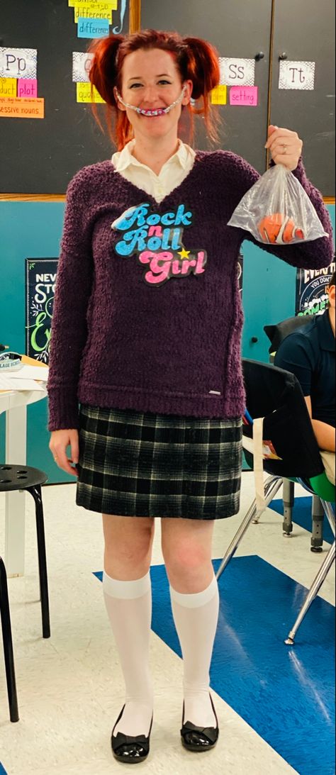 Super easy costume! Items needed: -purple sweater or sweatshirt (thrift shop) -white button down (thrift shop or Amazon) -plaid skirt (thrift shop) -white knee high tights (Walmart) -black shoes (thrift shop) -print out of decal (iron on or tape it on- I did just tape) -silver pipe cleaner for the braces head gear -Nemo toy -plastic bag #costume #halloween #halloweencostumeswomen #funnyhalloweencostumes Shoes Thrift, Knee High Tights, Easy Costume, Diy Costume, Head Gear, Easy Costumes, Thrift Shop, Funny Halloween Costumes, White Button Down