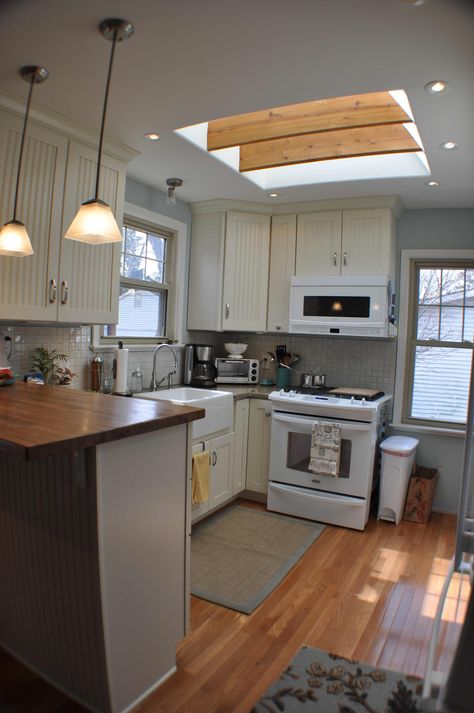 Ahhhhg! My Ceiling heat prevents more overhead lighting and a skylight. I want both. Kitchen With Skylight, Green Laminate, Kitchen Skylight, Skylight Kitchen, Small Kitchen Layouts, Kitchen Layout Plans, Small Kitchen Organization, Small Kitchen Storage, Small Kitchen Remodel