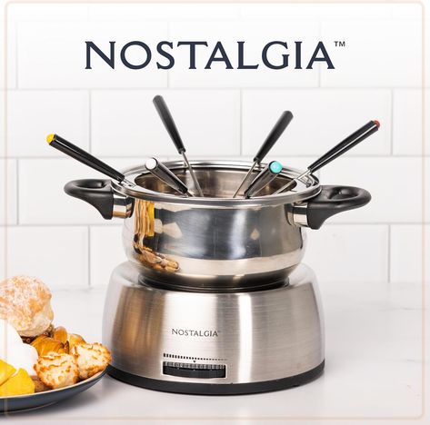 Nostalgia 6-Cup Electric Fondue Pot Set is ideal for melting cheese and chocolate, perfect for hors d'oeuvres and desserts. Made from stainless steel, this fondue pot combines durability and functionality for a stylish addition to any gathering.
As an Amazon Associate I earn from qualifying purchases. Fondue Pot Stands, Dessert Fondue, Cheese Dips, Fondue Forks, Decadent Chocolate Desserts, Fondue Recipes, Fondue Pot, Artisan Food, Fruit Dip