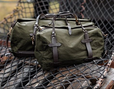 Made of rugged Twill and saddle-grade Bridle Leather. Filson duffle bags are made in the USA and guaranteed for life. Shop unfailing goods since 1897. Get Free Shipping Today. Filson Duffle, Filson Bags, Rolling Duffle Bag, Mens Weekend Bag, Womens Luggage, Mossy Oak Camo, Leather Duffle Bag, Leather Duffle, Dry Bag