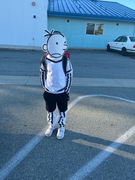 -white long sleeve shirt
-white short sleeve shirt
-white sweat pants
-black shorts
-black electrical wire tape
-white foam sheet
-thick Sharpie
-x acto knife
-elastic band
-hot glue and gun
And one awesome slouchy kid Diary Of A Wimpy Kid Costume, Character Day Spirit Week, Wacky Tacky Day, Tacky Day, Character Day Ideas, Book Parade, Character Day, Spirit Days, Book Character Day