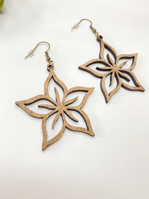 Wow! Aren't these lilies simply beautiful? They compliment any outfit. They are lightweight and a perfect size. These ready-to-wear earrings are laser cut out of maple and walnut wood. To order: Simply select the wood choice -If you have any questions please feel free to contact us directly.  - If you live in the San Diego, CA area, local pick-up is available. Please use coupon code PICKUP21 during checkout so I know you plan to pick up your item. (Coupon is ONLY to be used if you intend to pick Earrings Bridesmaid, Employee Appreciation, Handmade Jewelry Gift, Wooden Earrings, Star Flower, Bridesmaid Earrings, Simply Beautiful, Walnut Wood, Coupon Code