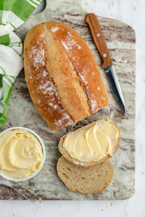 buttered slices of Italian bread next to loaf Home Made Italian Bread Recipes, Italian Sweet Bread Recipes, Italian Loaf Bread Recipes, Italian Bread Recipes Homemade, Homemade Italian Bread, Italian Loaf, Italian Bread Recipe, Loaf Bread Recipe, Tin Loaf