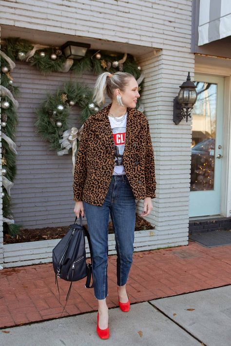 Cool Holiday Outfit Inspo: Band T-Shirts Made Festive | The Mom Edit Holiday Outfit Inspo, Tee Shirt Outfit, Mom Edit, Holiday Party Fashion, Christmas Tee Shirts, Chic Holiday, Tokyo Street Style, Band T Shirts, Christmas Outfits