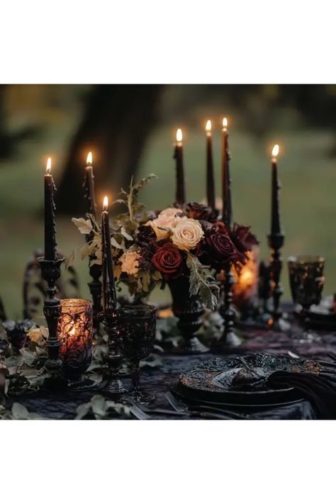 Transform your space with these charmingly eerie DIY Gothic candle holders perfect for a Halloween tablescape! Whether you're gearing up for a spooky dinner party, a goth-themed gathering, or simply want to add character to your home decor, this creative project is both easy and fun. Get tips on materials to use, unique design ideas that will set the mood, and how to create a haunting atmosphere with just a few simple steps. Your guests won't be able to resist complimenting your spooky setups! Gothic Wedding Decorations Centerpieces, Halloween Party Gothic, Gothic Romance Party, Goth Tablescape, Goth Party Theme, Goth Dinner Party, Gothic Tablescape, Gothic Centerpieces, Goth Party Decorations