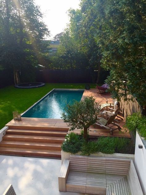 Sunken Pool Area: If you can't fully bury the pool, you can create a sunken seating area near the pool. Lower the surrounding yard or patio area to the same level as the pool, creating the impression that the pool is at ground level.

Hashtags for Above-Ground Pool Ideas:
#AboveGroundPool
#BackyardPool
#IngroundPoolLook
#LuxuryBackyard
#PoolDeckDesign
#PoolTransformation Best Above Ground Pool Ideas, Raised Pool Ideas, Swimming Pools Backyard Above Ground, Pools Backyard Above Ground, Sunken Pool, Dip Pool, Sunken Seating Area, Sunken Seating, Sunken Trampoline