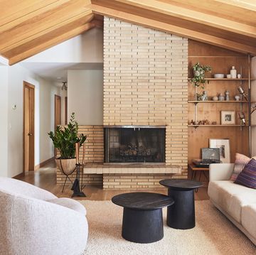 living room with fireplace Extended Hearth Fireplace, Maple Living Room, Mcm Tile Fireplace, Fireplace Walls Mid Century, Mid Century House Exterior Makeover, Central Fireplace Ideas, Contemporary Fireplace With Built Ins, Mid Century Living Room Tv, Mis Century Modern Fireplace