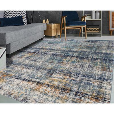 Introducing the ultimate blend of style and functionality - the high-low Ziebarth Abstract Blue area rug that is sure to elevate your home decor to new heights! With its gorgeous blend of colors, including blue, teal, aqua, rust, and silver, this rug is the perfect accent piece to bring a touch of elegance to any room. Crafted from high-quality polyester and polypropylene, this rug is designed to withstand the demands of everyday life. With its stain-resistant properties, it can withstand spills Abstract Area Rug, Blue Area Rug, Blue Area, Cotton Pillow, Blue Ivory, Online Home Decor Stores, Blue Rug, Bungalow Rose, Blue Area Rugs