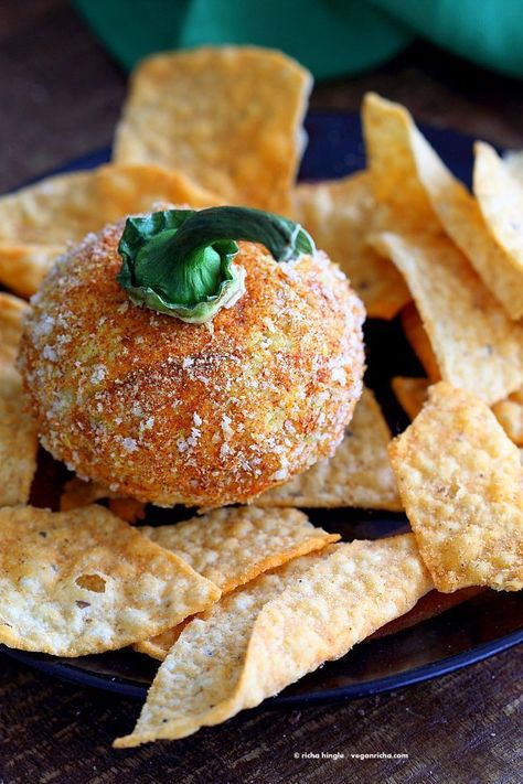 Vegan Cheese Ball. Nut-free Cheddar Cheese ball for Halloween. Shape like pumpkin or make a Jack o lantern. | VeganRicha.com #Vegan #Cheese #Recipe #dairyfree #soyfree Pumpkin Cheeseball, Vegan Cheese Ball, Halloween Cheese Ball, Vegan Halloween Recipes, Cheddar Cheese Ball, Vegan Halloween Food, Vegan Cheddar Cheese, Dairy Recipes, Vegan Cheese Recipes