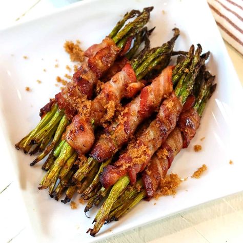 This bacon wrapped asparagus air fryer recipe is so good. Dare I say they are like asparagus bundles of bacon and brown sugar crack? 😉 Easy to make and a huge hit whenever they're served! Air fryer bacon wrapped asparagus can be made with regular brown sugar and maple syrup - or use a substitute (it's just as good) to make these sugar free and keto. Maple Bacon Asparagus, Low Carb Easter Dinner, Asparagus Air Fryer, Dinner Ideas Keto, Asparagus Bundles, Easter Dinner Ideas, Keto Easter, Bacon Wrapped Green Beans, Air Fryer Bacon