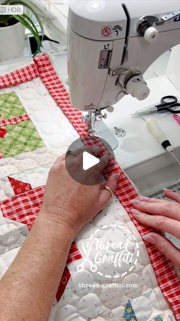 Gina Tell ✂️ Thread Graffiti on Instagram: "Step #behindtheseams with me and let’s make a flange binding on my new Home Town Holiday table runner!  As many of you know I am all self taught, so I might not do things the traditional way but that’s the fun thing about being creative, there are no rules!! 

Comment ‘Binding’ and I will send you the links to my binding rulers and YouTube tutorials.  Or the next time you have a special quilt done sent it to me for longarm quilting service and I will do the binding for you! ❤️✂️🧵
Batting: 80/20 Hobbs
Fabric: Hometown Holiday @beelori1 @fatquartershop
Panto: Circles @juliehirt
Maker: ME 😍

Find me at Thread-Graffiti.com for longarm and binding services!

#flangebinding #handbinding #holidaydecor FatQuarterShop #HomeTownHoliday #LoriHolt #christm Adding Binding To A Quilt, Easy Binding For Quilts, Machine Quilting Ideas, Flange Binding, Quilting Hacks, Binding Quilt, Longarm Quilting Tutorials, Binding Techniques, Quilt Binding Tutorial