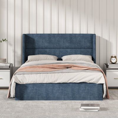 This storage platform bed is designed with a hydraulic lift system that allows for easy lifting and lowering of the bed platform, providing ample under-bed storage space. It is upholstered with high-quality fabric, giving it a sleek and modern look. The two protruding ear wings give a sense of security and enclosure. Color: Misty Blue, Size: Full/Double | Latitude Run® Annek Tufted Storage Platform Bed Upholstered / Linen in Blue | 40.94 H x 58.85 W x 80.7 D in | Wayfair Lift Up Bed, Upholstered Storage Bed, Storage Platform Bed, Bed Platform, Storage Platform, Wingback Headboard, Green Bedding, Headboard Designs, Upholstered Storage