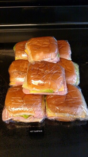 Copycat Kmart deli ham sandwiches. Boiled or chopped ham,american cheese,lettuce,mustard,and hamburger buns. Wrap them in plastic wrap place in refrigerator for two hours then eat.  Blast from the past. Kmart Deli Sandwiches, Kmart Ham Sandwich Recipe, Kmart Subs, Deli Sandwiches Recipes, Ham Sandwich Recipes, Cuban Sandwich Recipe, Deli Style Sandwiches, Waffle Cone Recipe, Ham Sandwich