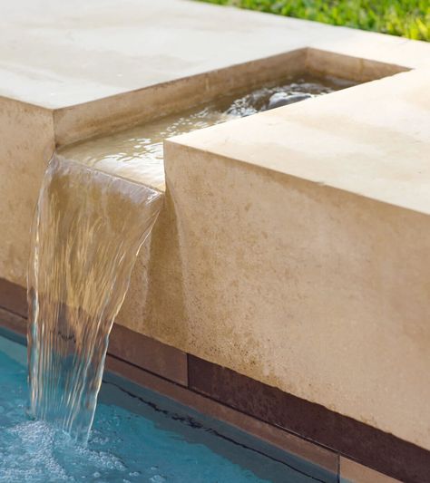 Boulder Water Feature Highlights this D Magazine Most Beautiful Home Natural Waterfall Pool, Pool With Water Feature Wall, Pool Spouts Water Features, Pool Water Features Waterfalls, Pool Scuppers, Boulder Water Feature, Pool Waterfall Ideas, Water Feature Lighting, Swimming Pool Fountains