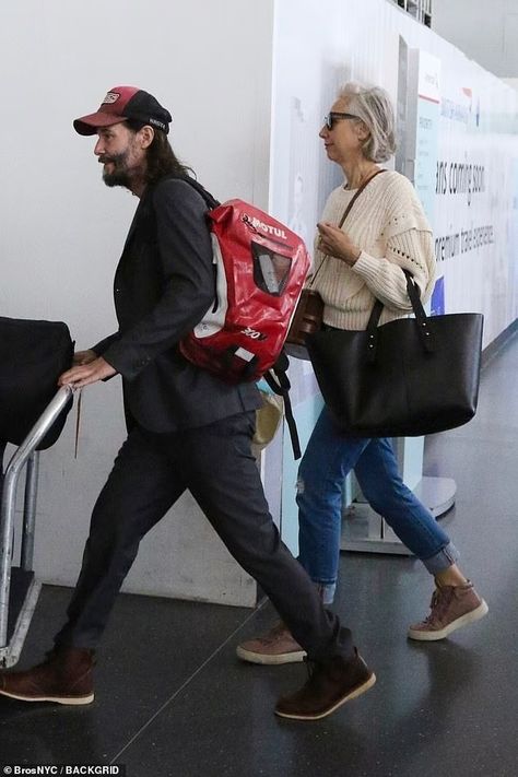 Keanu Reeves and Alexandra Grant at NY airport Keanu And Alexandra Grant, Keanu Reeves Alexandra Grant, Alexandra Grant, Floral Print Maxi Skirt, Keanu Reeves, Vr Goggle, A Good Man, Gentleman, Maxi Skirt