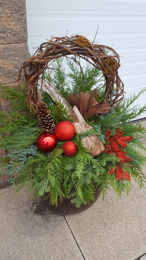 Porch Pots Winter, Porch Pots Ideas, Winter Outdoor Planter Ideas, Winter Planters Front Porches, Winter Porch Pots, Christmas Floral Arrangements Diy, Outdoor Planter Ideas, Christmas Urns, Christmas Flower Decorations