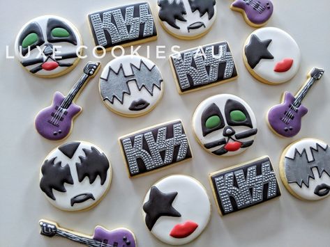 Royal Icing Kiss themed vanilla cookies for an awesome rock party. For more fun cookies, click on the link, or head across to Instagram and see some more designs by @luxe_cookies_au. #kiss #kisscookies #royalicing #royalicingcookies #decoratedsugarcookies #luxecookiesau #music #musiccookies #kisstheband #kissthebandcookies Kiss Band Cookies Decorated, Kiss Band Birthday Party, Kiss Themed Party, Kiss Band Party, Kiss Birthday Party, Crazy Kiss, Kiss Party, Cookie Board, Music Cookies