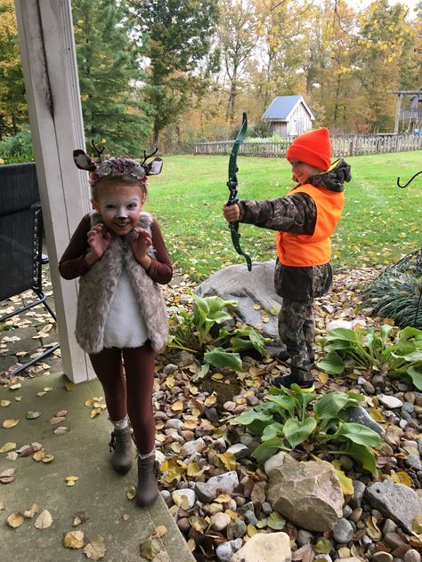 Deer and hunter costume Deer Hunter Costume Kids, Woodland Creature Family Costumes, Girl Hunter Costume, Family Deer Costume Ideas, Kids Deer Costume Diy, Hunter And Animal Halloween Costume, Hunting Costume Ideas, Deer And Hunter Family Costume, Family Hunting Halloween Costumes