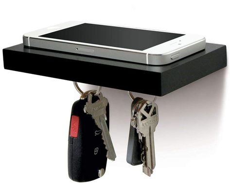 Promising review: "I used the hardware provided and was pleased with how much it can withstand. I was a bit skeptical as to how many items it could hold due to the small magnetic strip so I put it to the test and grabbed everything magnetic in my immediate vicinity. I have bulky keychains with remote start/LCD screens for vehicles, USBs, medical scissors, measuring tape, wallet, glasses, phone...and they all held. As to why you would hang that amount of stuff on a minimalist shelf? I don't know, Wall Phone Holder, Wall Mounted Wood Shelves, Wall Phone, Led Dog Collar, Wood Shelf, Wine Bottle Holders, Dog Leads, Technology Gadgets, Wood Shelves