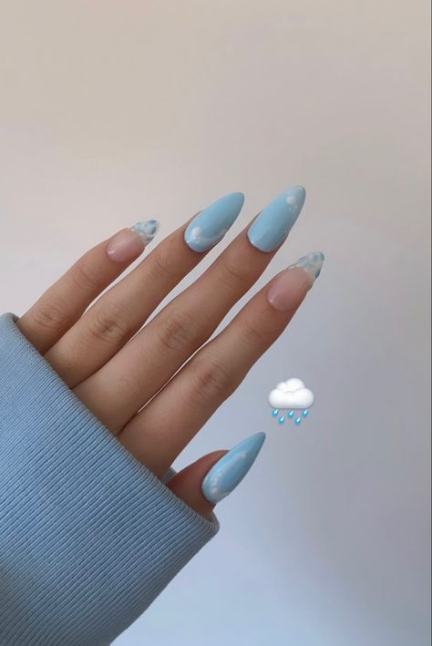 Hand in front of wall showing of baby blue “rainy day puddles” inspired nails. Pinky and pointer fingers have raindrops creating a french tip design while the other fingers have a puddle design. Blue Rain Nails, Rainy Day Nail Art, Rain Inspired Nails, Rainy Season Nails, Rain Nails Design, Rainy Nails, Rain Nails, Emoji Nails, April Rain