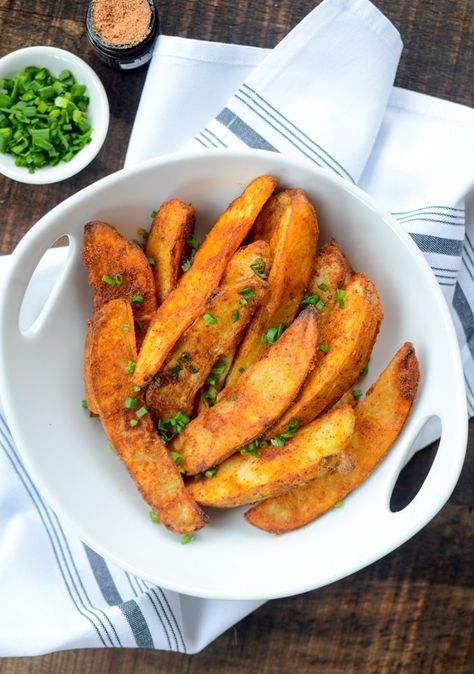 Air Fryer Spiced Potato Wedges are the perfect healthy alternative to French fries, with their crispy finish and golden-fried hue.  | theeverykitchen.com Air Fryer Recipes Potatoes Wedges, Air Fried Potatoes Wedges, Crispy Potato Wedges Fried, Air Fryer Jojo Potato Wedges, Potatoe Wedges In Airfryer, Air Fryer Recipes Chips, Wedge Fries, Air Fryer French Fries, Fresh Potato