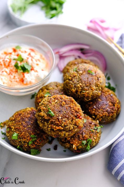 The Mutton Shami kabab is a great starter dish for lunch or dinner and can even be had as a tasty snack.  It is perfectly spiced with the intoxicating spice blend and makes everything better!  A delicious snack from the authentic Hyderabadi cuisine,  It is a perfect blend of authentic flavours of the rich and aromatic spices that make the mutton kebab tasty.  A delectable texture of the kabab – crunchy on the outside and soft on the inside gives it an exciting texture to enjoy.  This Mutton keba Shami Kebab Photography, Shami Kabab Photography, Kabab Food Photography, Mutton Kebab, Mutton Kabab, Hyderabadi Food, Kebab Restaurant, Hyderabadi Cuisine, Shami Kabab