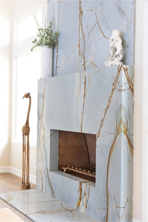 Home interior fireplace with living room decor and light blue marble material Blue Fireplace, Light Blue Marble, Interior Fireplace, Organization Company, Fireplace Fronts, Fireplace Lighting, Marble Fireplace, Fireplace Ideas, Marble Fireplaces