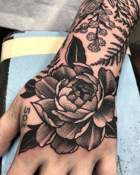 Floral hand tattoo Floral Hand Tattoo Men, Tattoo Cover Up Ideas Hand, Cover Up Tattoos Floral, Hand Tattoo Coverup, Whole Hand Tattoos, Hand Coverup Tattoo, Hand Tattoos Traditional, Peony Hand Tattoo, Hand Tattoo Cover Up Ideas