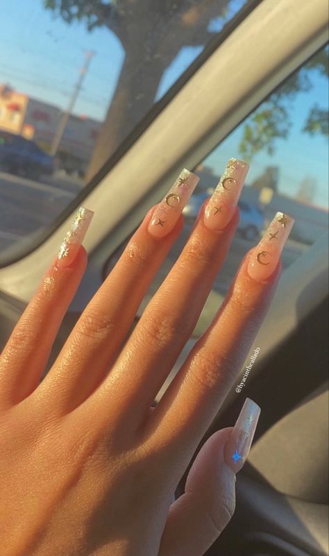 elegant simple sparkly nails with moon and star gems Sparkly Nail Inspiration, Nails With Rhinestones And Stars, Cute Bedazzled Nails, Twinkle Nails Acrylic, Starry Nails Acrylic, Nails With The Moon, Nail Gems Simple, Square Nails Prom, Nails Inspiration Stars And Moon