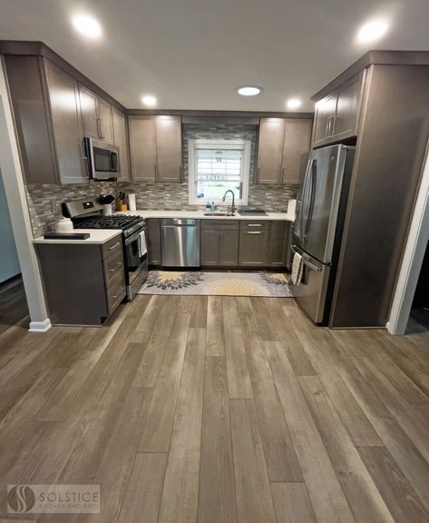 Brown Lvp Flooring Kitchen, Vynil Flooring Kitchen, Wood Vynil Flooring Ideas, Brown Flooring Kitchen, Condo Flooring Ideas, House Cupboards, Kitchen Wood Flooring Ideas, Brown Kitchen Tiles, Kitchen Flooring Ideas Vinyl