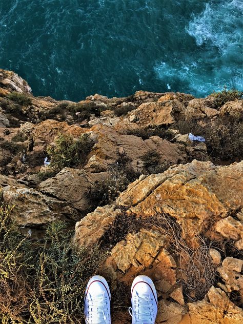 #Travel #Cliff #Sky #Clouds #Nature #Edge #Europe #Trip #Life #Wallpaper #wpp #Joy #iPhone7 #Portugal #Converse #ShotoniPhone Cliff Edge Aesthetic, Edge Of Cliff Aesthetic, Script Base, Cliff Aesthetic, Edge Of Cliff, Two Oceans Meet, Hd Carlton, Ocean Cliff, Cliff Edge