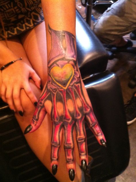 skeleton hand tatoo Skeleton Fingers Touching Tattoo, Red Skeleton Hand Tattoo, Skeleton Fingers Crossed Tattoo, Rose And Skeleton Hand Tattoo, Skeleton Hand Tattoo Design, Red Skull Hand Tattoo, Skelton And Rose On Hand Tattoo, Skeleton Hand Tattoo Girl, Skeleton Hand Tattoos