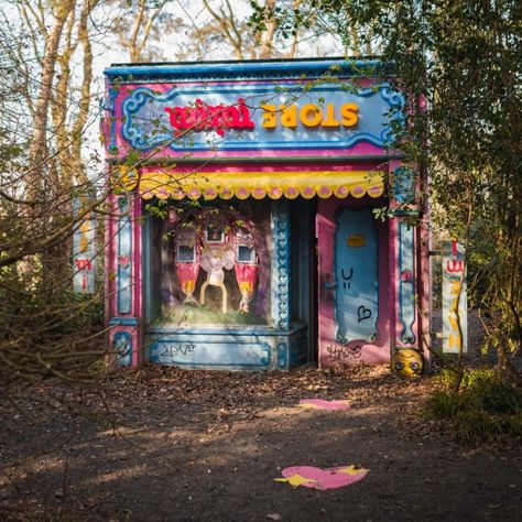 In the forests of Jupiter Artland—the 120-acre outdoor sculpture park near Edinburgh—Scottish artist Rachel Maclean installed an eerie, graffiti-covered toy store with upside-down attributes aplenty. The sinister structure houses unsettling doppelgänger dolls, as well as Maclean’s new 10-minute animated film, which explores the pressures upon youth (from self-esteem to consumerism and predatory behavior) through the struggles of a cartoon princess. It is the artist’s first … Rachel Maclean, Jupiter Artland, Cartoon Princess, The Sinister, New Fantasy, Scottish Artists, Princess Cartoon, Sculpture Park, Trunk Or Treat