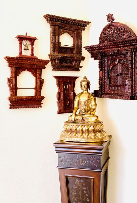 This corner flaunts amazing Nepali wooden crafts. All these traditional windows and the brass buddha idol are handmade in Kathmandu. #traditionalhomedecor #interior #interiordesignideas #woodcrafts #nepal #nepali #cornerofmyhome #indianhomedecor #buddha #brass #traditional #kathmandu Nepali Interior Design, Nepali Interior, Nepali Decor, Buddha Idol, Traditional Windows, Art Corner, Indian Home Decor, Antique Wall Clock, Wooden Art