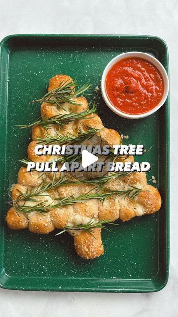 Sophia Inza on Instagram: "CHRISTMAS TREE CHEESY PULL APART BREAD 🥖🎄 🧀 such a perfect Christmas appetizer or afternoon snack. It’s fun to make and so delicious!  13 ounce canned refrigerator pizza dough 6 mozzarella cheese sticks 1 large egg + 1 tsp water, whisked 3 tablespoons butter melted 1 tbsp Italian seasoning 1 clove garlic grated 1/2 cup grated parmesan cheese, divided 1 cup marinara 7-8 sprigs of rosemary, optional  Roll out the canned dough and cut into 30 squares. Cut each mozzarella stick in 5 pieces. Wrap each piece of mozzarella in one square of dough and roll it into a ball. Assemble on a parchment lined baking sheet to look like a Christmas tree. Brush with the egg wash and bake at 400 for 15-20 min or until golden and puffy. Remove from oven and brush with butter, garli Christmas Tree Shaped Pull Apart Bread, Tree Bread Appetizer, Christmas Tree Pull Apart Appetizer, Pizza Dough Christmas Tree Appetizer, Refrigerator Pizza Dough, Pull Apart Christmas Tree Bread, Christmas Tree Pull Apart Bread, Christmas Tree Bread, Mozzarella Stick