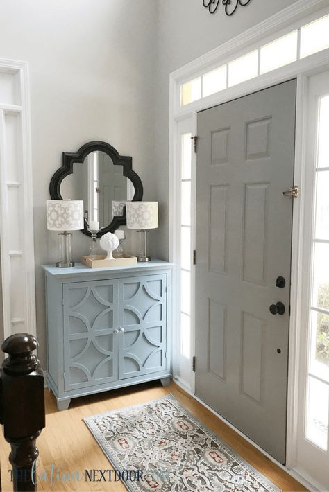 Sometimes, even the smallest contrast in color between your front door, trim and walls can add big style to an entryway. Here, Yami from @yamithelatina kept things simple. Her philosophy? To add a little bit of drama, paint the inside of the front door something other than white. Choose a color several shades darker than the wall to add dimension. Great advice, and great color selection. Her door is Pussywillow SW 7643, her trim is Extra White SW 7006 and her walls are Repose Gray SW 7015. Gray Interior Front Door, Sherwin Williams Paint Gray, Entry Door Colors, Gray Doors, Interior Front Door, Entryway Stairs, Door Colors, Repose Gray, Grey Doors