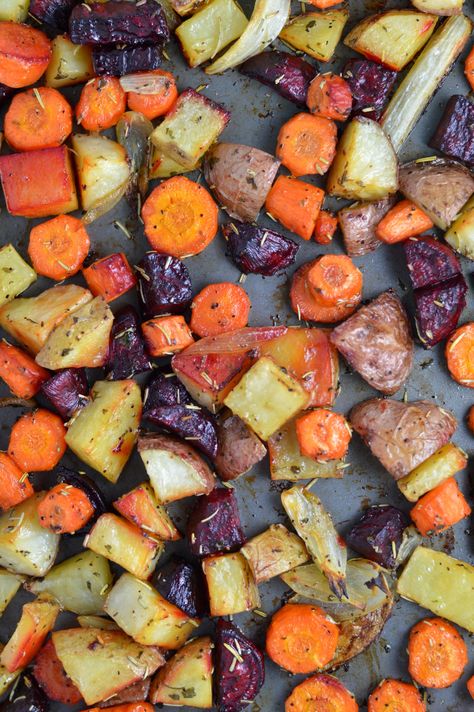 This Roasted Potatoes, Carrots and Beets recipe is the perfect way to roast your root vegetables. Seasoned with balsamic vinegar and rosemary. Roasted Potatoes Carrots, Carrots And Beets, Roasted Beets And Carrots, Beets Recipe, Root Vegetables Recipes, Beets Carrots, Roasted Potatoes And Carrots, Carrots Recipe, Potatoes Carrots