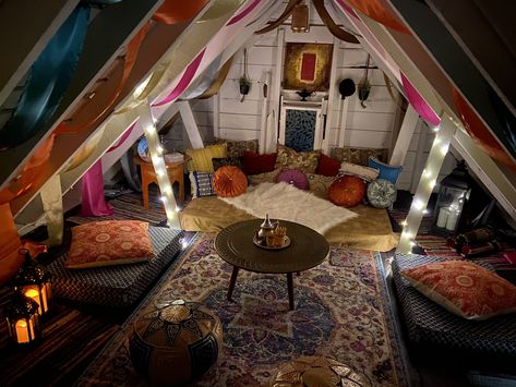 Turning the other half in the attic to Moroccan sitting area Aesthetic Attic Hangout, Cute Attic Hangout Ideas, Indie Attic Bedroom, Attic Witchy Room, Orange Attic Room, Unfinished Attic Hangout, Triangle Roof Room Ideas, Bohemian Attic Bedroom, Floor Hangout Area