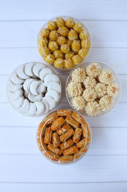 Four jars of assorted cookies for eid mu... | Premium Photo #Freepik #photo #natural-food #fresh-food #peanut #organic-food Toples Lebaran, Assorted Cookies, Kuih Raya, Cooking Cookies, Rose Brand, Cake Logo, Business Awards, Christmas Celebration, Plastic Jars