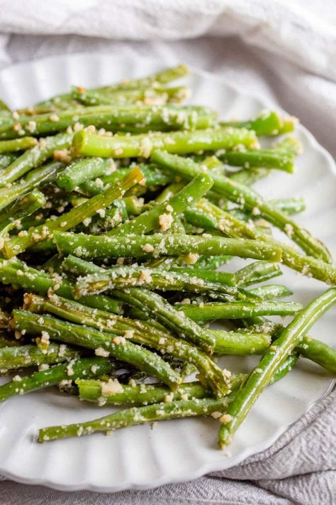 Garlic Parmesan Green Beans are an easy green bean side dish made on the stovetop with fresh garlic and grated Parmesan Cheese! Garlic Green Beans With Olive Oil And Parmesan, String Green Bean Recipes, Fresh Green Bean Recipes Skillet, Roasted Green Beans Oven, Parmesan Crusted Green Beans, Green Bean Recipes Skillet, Garlic Parmesan Green Beans, Green Bean Side Dish, Bean Side Dish