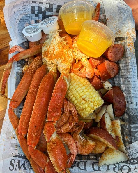 Crab boil, crab legs, corn, sausage, shrimp peel and eat shrimp, crab, butter, summer food, vacation Crab Boil, Peach Ice Tea, Seafood Entrees, Coconut Shrimp, Good Eat, Yummy Comfort Food, Food Platters, Iced Tea, Crab